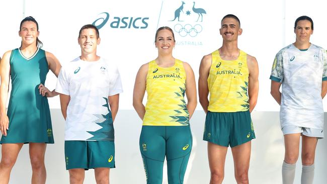 SYDNEY, AUSTRALIA - MARCH 07: Athletes pose on stage during the Australian 2024 Paris Olympic Games ASICS Uniform Launch at Yurong Point (Mrs Macquarie's Chair) on March 07, 2024 in Sydney, Australia. (Photo by Mark Metcalfe/Getty Images)