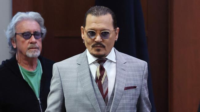 Depp arrives with celebrity therapist Beechy Colclough (L) at the Fairfax County Circuit Courthouse on May 26. Picture: AFP