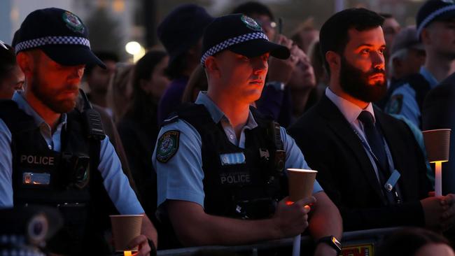 NSW Police officers attending the vigil. Picture: Getty Images