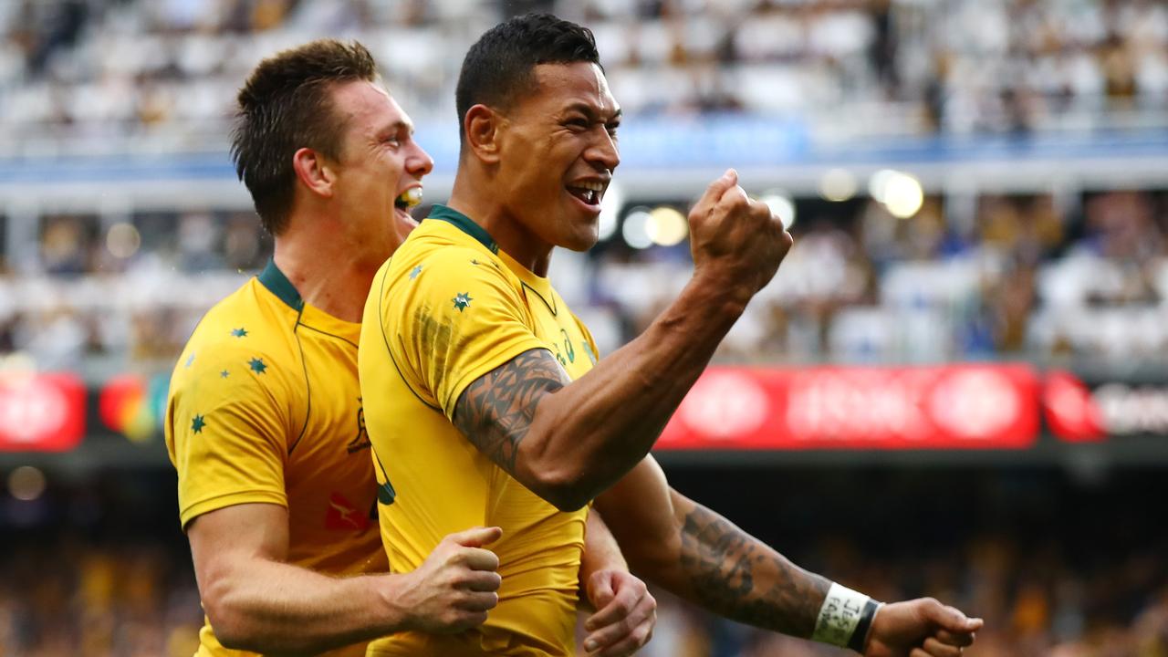 Israel Folau of the Wallabies celebrates scoring a try with Dane Haylett-Petty.