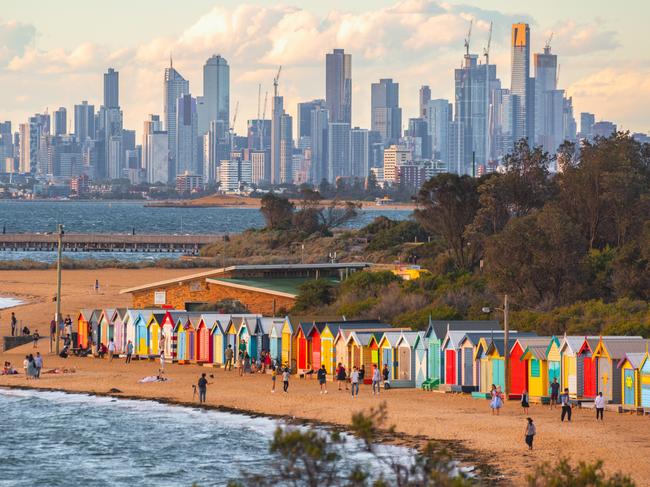 Brighton bathing boxes and Melbourne skyline.Escape 27 August 2023Twin Share - Neil WhitakerPhoto - Getty Images