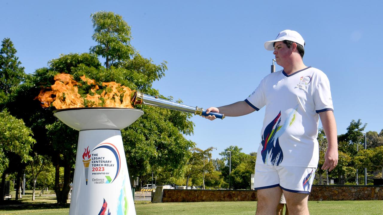 Legacy Centenary Torch Relay and community day at Jezzine Barracks. Torch bearer Mitchell Bingley lights the cauldron. Picture: Evan Morgan