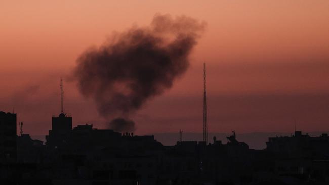 Smoke billows following an Israeli air strike at Gaza City. AFP)