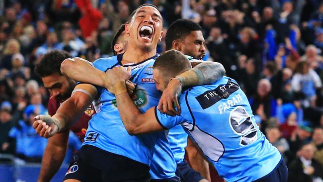 The Blues celebrate Michael Jennings’s last-gasp matchwinning try.