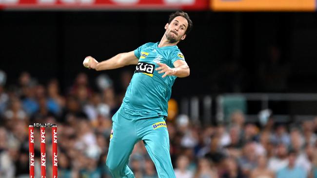 BRISBANE, AUSTRALIA - DECEMBER 27: Lewis Gregory of the Heat bowls during the Big Bash League match between the Brisbane Heat and the Hobart Hurricanes at The Gabba, on December 27, 2020, in Brisbane, Australia. (Photo by Bradley Kanaris/Getty Images)