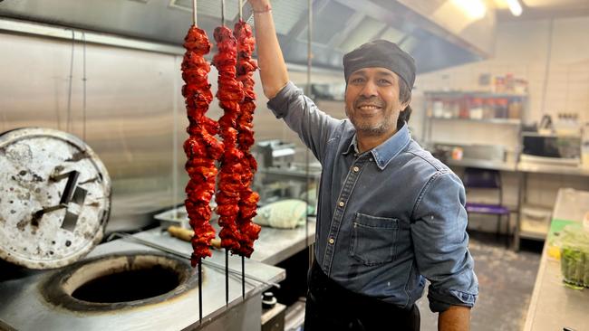 Amira's Indian Restaurant, in Sydney’s north west, is struggling to stay afloat because of rising cost of produce. Pictured here is the restaurant's tandoori chef Raj Kumar. Picture: Supplied