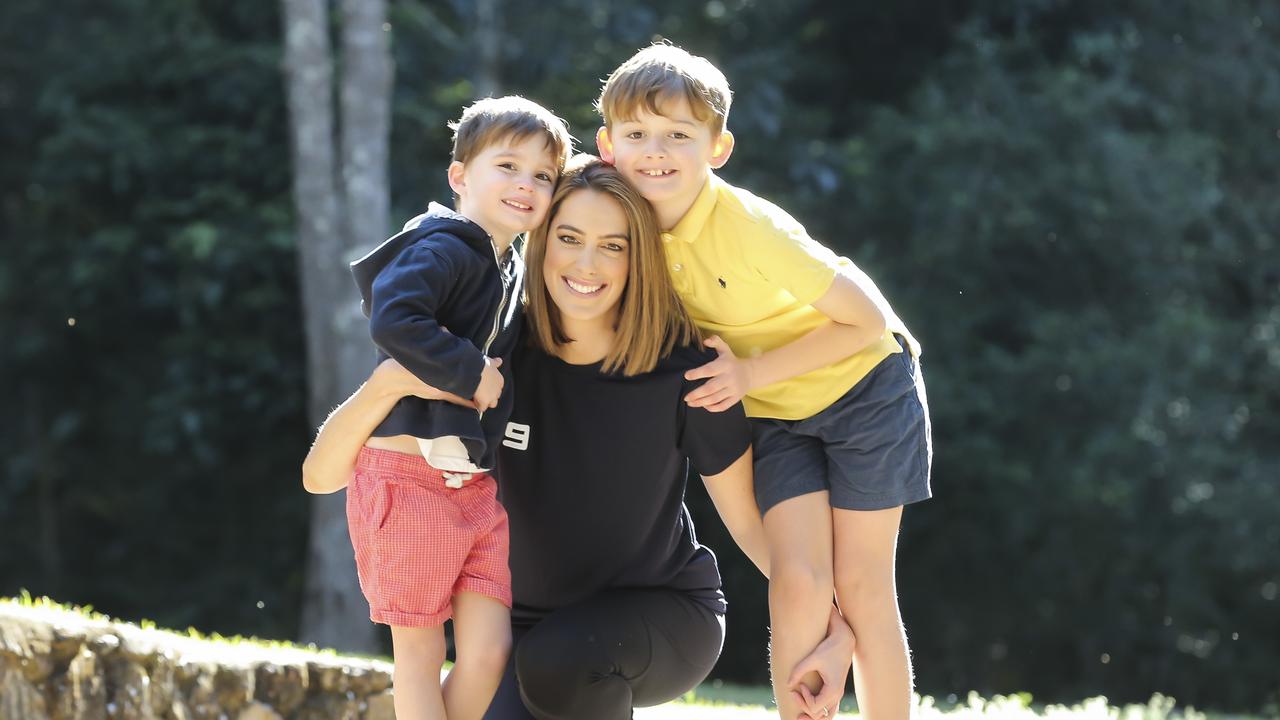 Ch 9 newsreader Samantha Heathwood with her two sons James (yellow shirt) and Henry in 2018. Picture: Mark Cranitch.