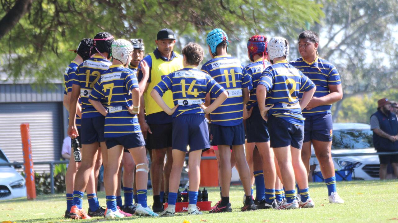 The Easts boys discussing the game plan.