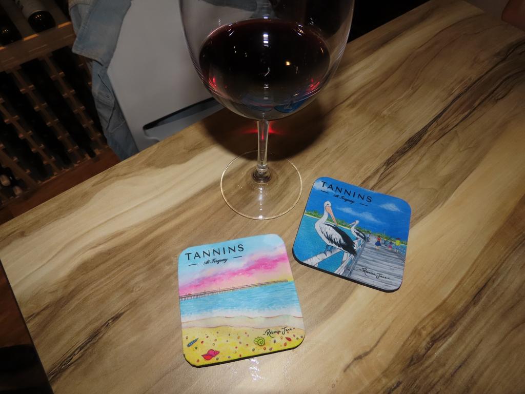 Rebecca Knowles from Art by Rebecca Jane designed the artwork for the Tannins at Torquay wine coasters.