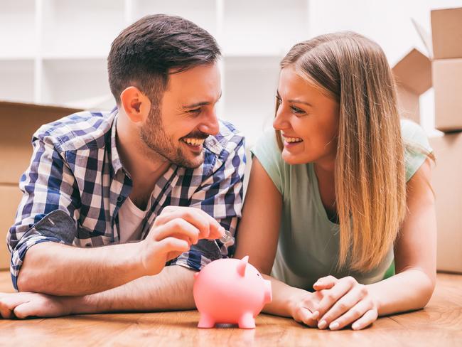 Young couple is saving money for their new home.