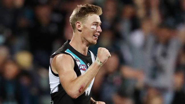 Todd Marshall celebrates one of his five goals against West Coast. Picture: Sarah Reed/AFL Photos via Getty Images