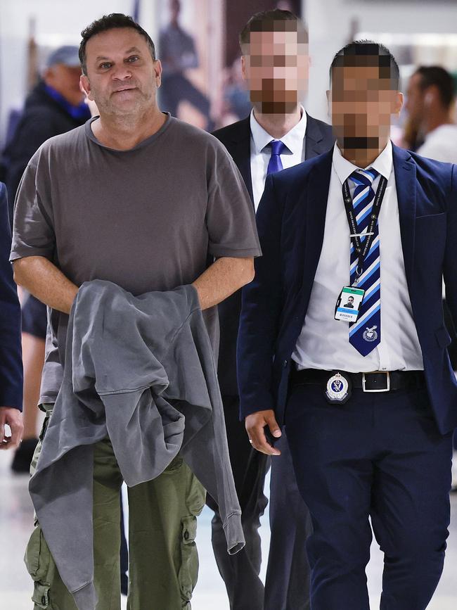 Eddie Hayson arrives at Sydney domestic airport from the Gold Coast.