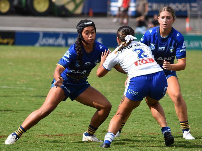 Logan Lemusu prepares to tackle Rastalia Smith. Picture: Sean Teuma