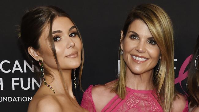 Lori Loughlin poses with her daughter Olivia Jade Giannulli, left, at an event in Beverly Hills.