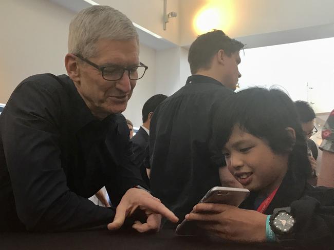 The youngest app developer at the WWDC is 10 year old Melbourne boy Yuma Soerianto pictured with Apple CEO Tim Cook. Picture: Rod Chester