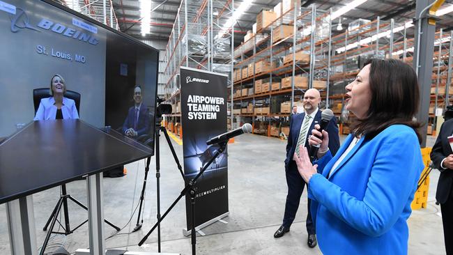 Queensland Premier Annastacia Palaszczuk (right) talks to Boeing’s Head of Autonomous Systems Kristin Robertson via a video link, during an event to announce a partnership between Queensland and Boeing Australia to assemble Boeing’s first Australia-developed unmanned aircraft. Picture: NCA NewsWire / Dan Peled