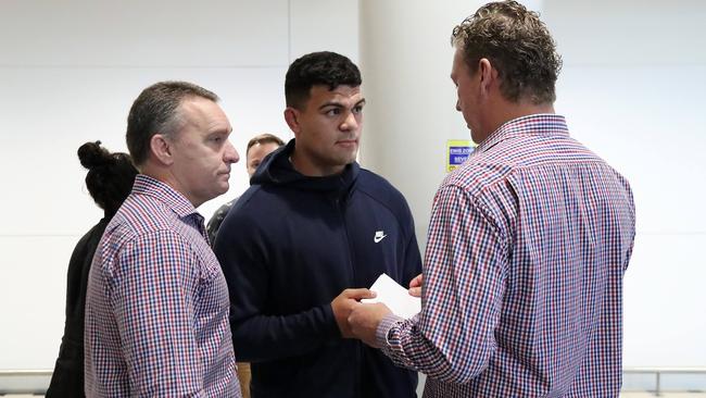 David Fifita with Broncos CEO Paul White after arriving back in Australia. Photo: Liam Kidston.