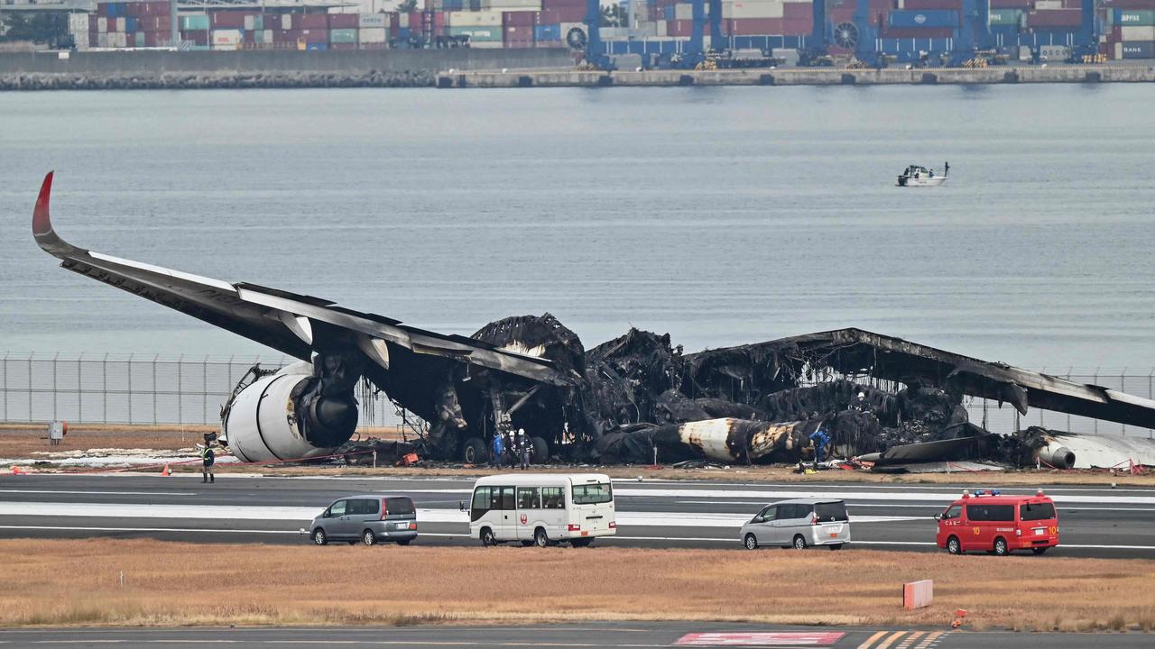 The wreckage of the Japan Airlines plane. Picture: Richard A. Brooks / AFP