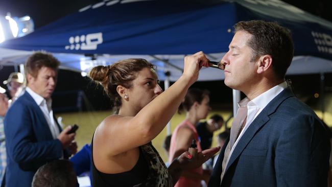 Even the blokes get their share of primping before going on set. Picture: Lachie Millard