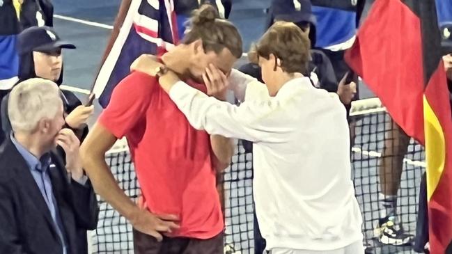 Jannik Sinner consols Alexander Zverev. Picture: Chantelle Francis