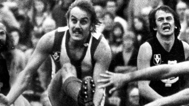 Malcolm Blight kicks a monster torpedo punt to win a North Melbourne clash with Carlton..