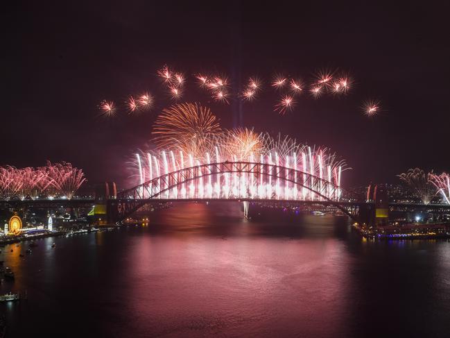 The Midnight fireworks explode over the Sydney Harbour Bridge on December 31, 2019.