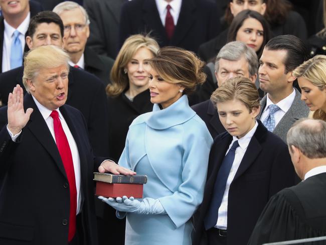 Donald Trump is sworn in as the 45th president of the United States by Chief Justice John Roberts as Melania Trump looks on during the 58th Presidential Inauguration at the U.S. Capitol in Washington on January 20, 2017. Picture: AP