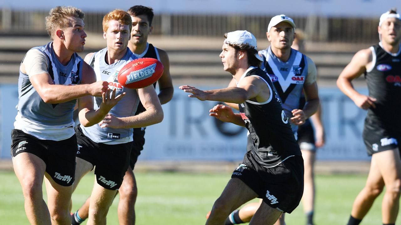 Ollie Wines, left, in action in front of Willem Drew at Power training.