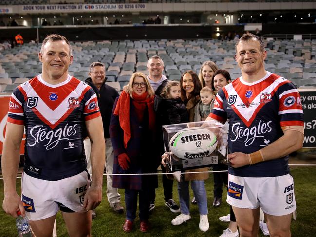 Brett Morris with his brother Josh after his 300th game. Picture. Phil Hillyard