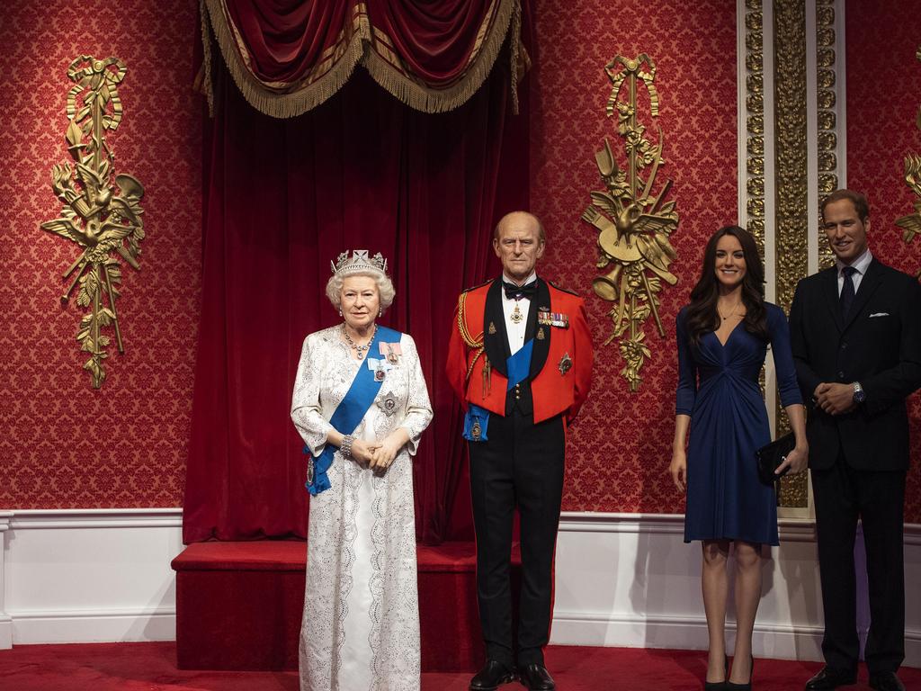 Madame Tussauds in London capitalised on the drama by moving the waxworks of Harry and Meghan away from those of the Queen, Prince Philip and Duke and Duchess of Cambidge. Picture: Victoria Jones/PA via AP.