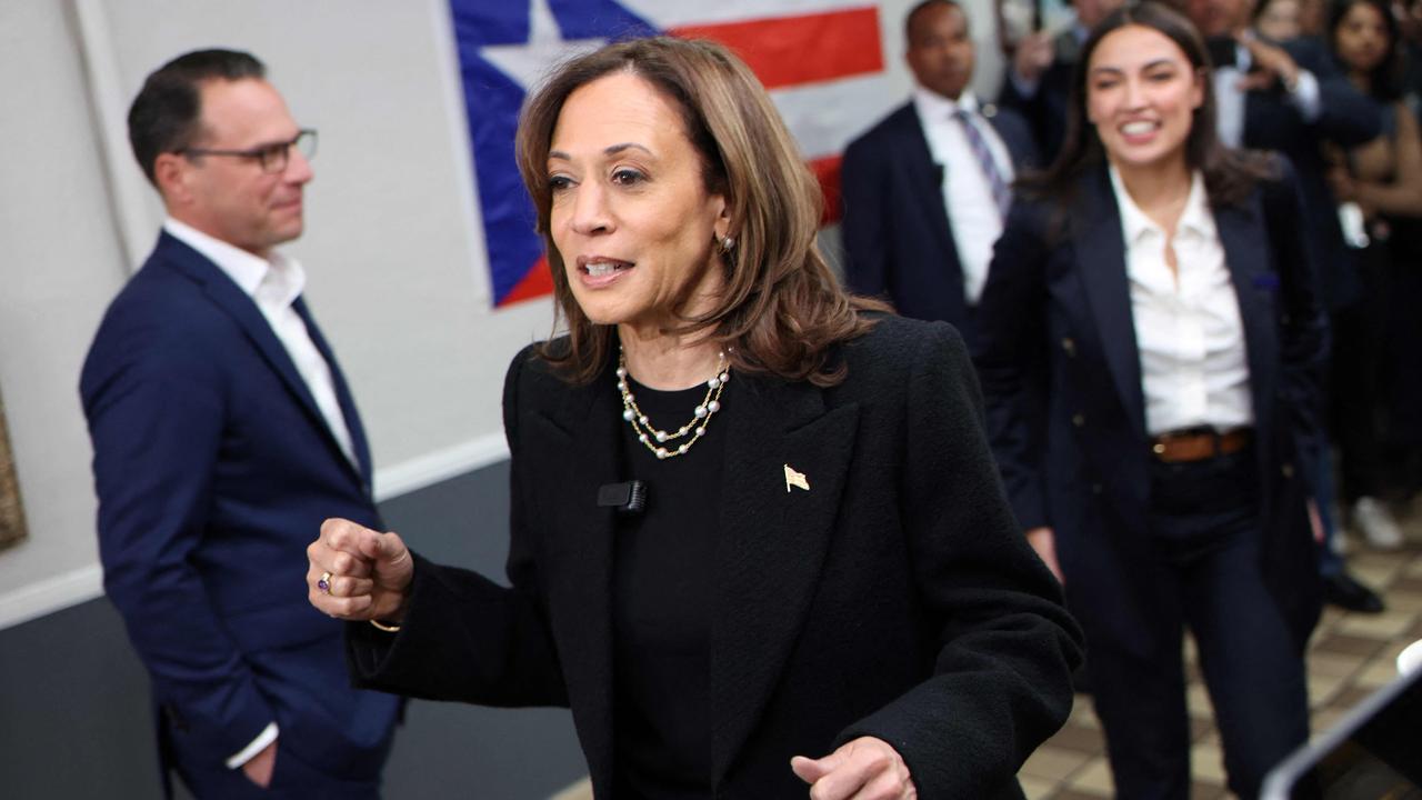 US Vice President and Democratic presidential candidate Kamala Harris, with Pennsylvania Governor Josh Shapiro, left, and US Representative Alexandria Ocasio Cortez, Democrat of New York, as she campaigns in Reading, Pennsylvania on November 4, would become the first female president in US history if she wins the election. Picture: Samuel Corum/AFP