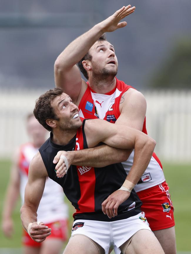 North Launceston’s Thomas Bennett and Clarence’s Wade Wall compete in a ruck contest in round three TSL action. Picture: Zak Simmonds