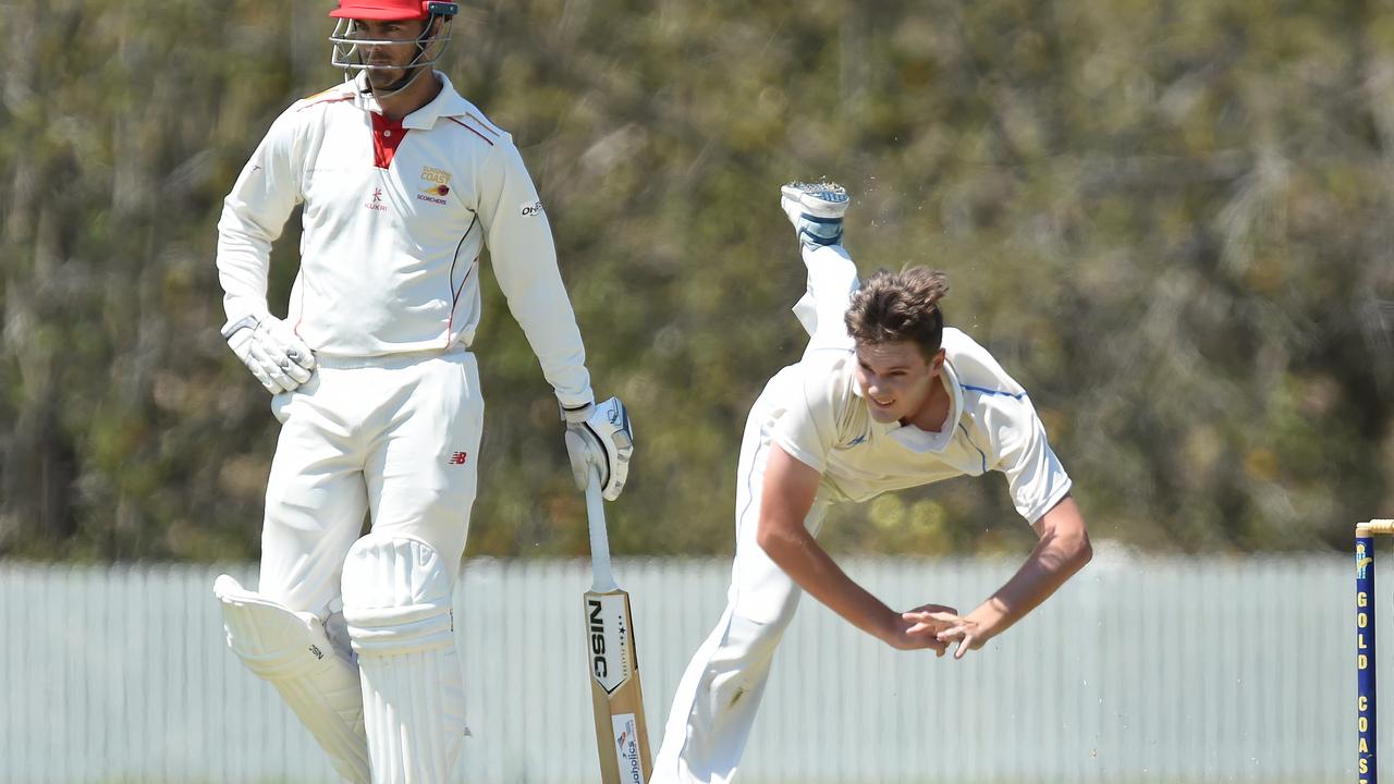 Josh Kann charges in during a Queensland Premier Cricket game.