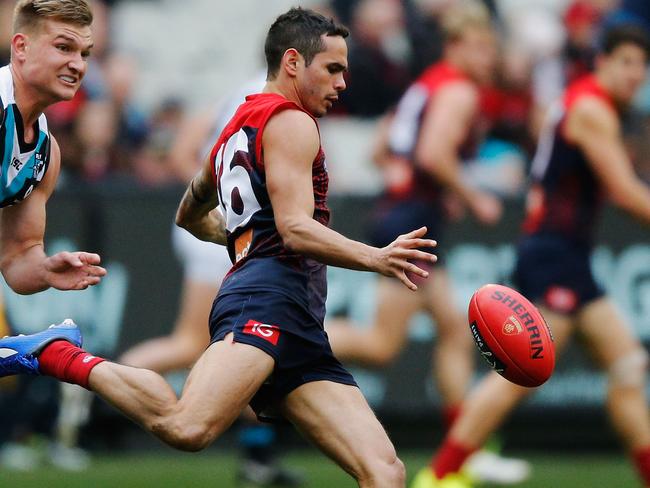 MELBOURNE, AUSTRALIA - JULY 22: Jeff Garlett of the Demons kicks the ball during the round 18 AFL match between the Melbourne Demons and the Port Adelaide Power at Melbourne Cricket Ground on July 22, 2017 in Melbourne, Australia.  (Photo by Michael Dodge/Getty Images)