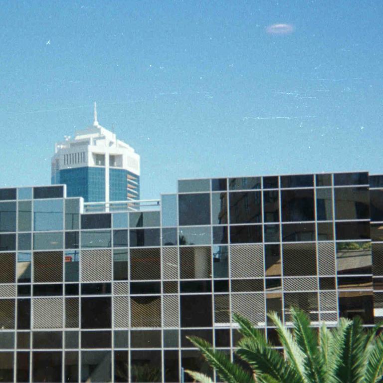 An unidentified flying object (UFO) photographed over the Dolphin Arcade building at Surfers Paradise in September 1998. Picture: Oswald Raeder
