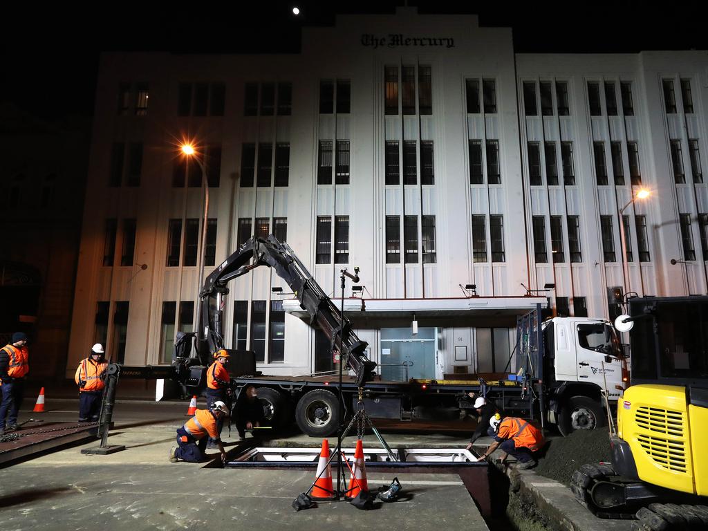 Work in Macquarie Street Hobart on the hole that will house the chamber performance artist Mike Parr will live in for 72 hours during Dark Mofo. Picture: NIKKI DAVIS-JONES