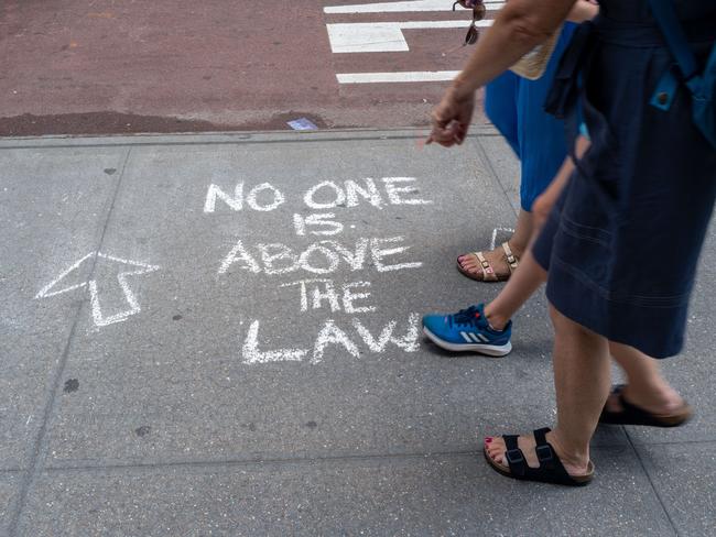 People walk by Trump Tower in Manhattan. According to a recent report, the FBI was looking for nuclear-related documents when they searched Mar-a-Lago. Picture: Getty Images/AFP