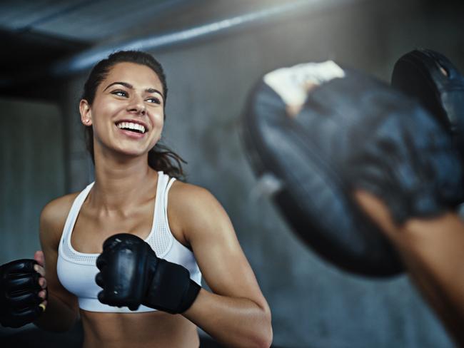 Istock for Gold Coast Eye fitness column gymShot of a young woman sparring with a boxing partner at the gym