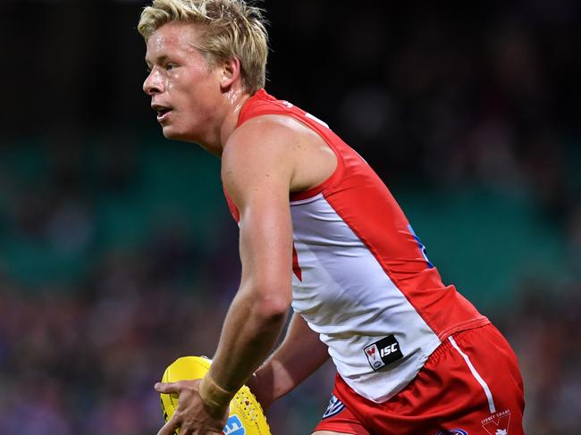 Heeney, Swans wake from slumber
