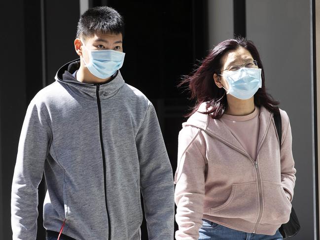 BRISBANE, AUSTRALIA - NewsWire Photos AUGUST 28, 2020: People wearing masks on street after Covid-19 cases have increased again in Queensland. Brisbane CBD, Friday August 28, 2020. Picture: NCA NewsWire / Attila Csaszar