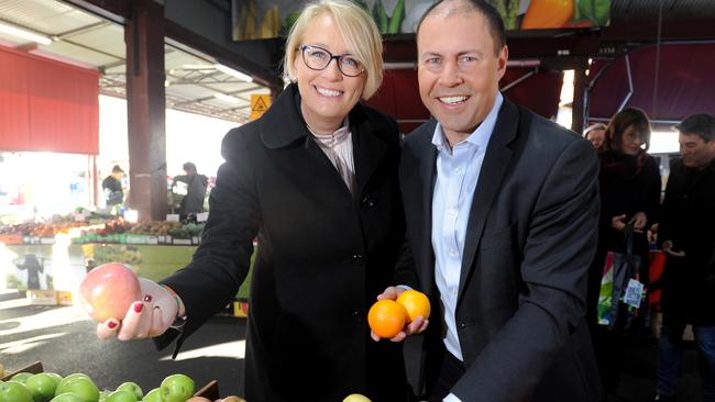 Lord Mayor Sally Capp and Federal Environment Minister Josh Frydenberg celebrate Queen Victoria Market being added to the National Heritage Register. Picture: Andrew Henshaw