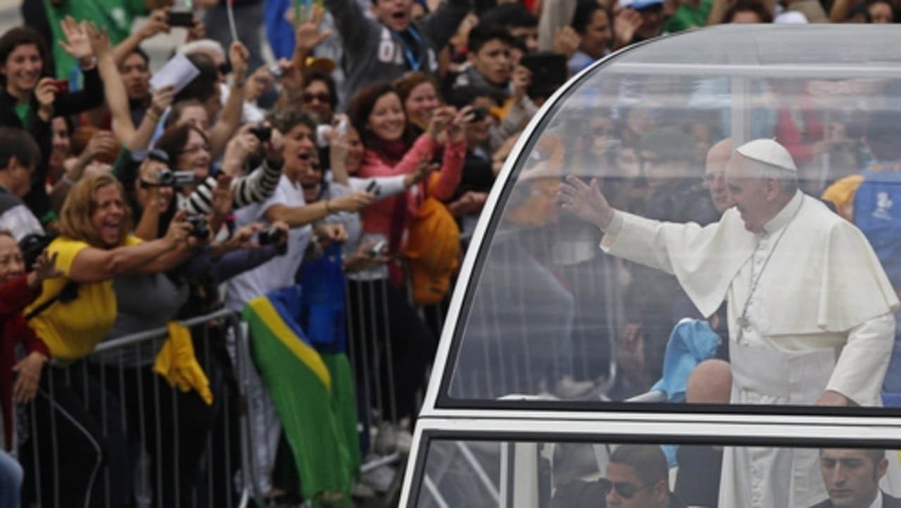 Popemobiles have featured bulletproof glass or plastic since the 1981 assassination attempt of Pope John Paul II. Picture: AP Photo/Silvia Izquierdo/file