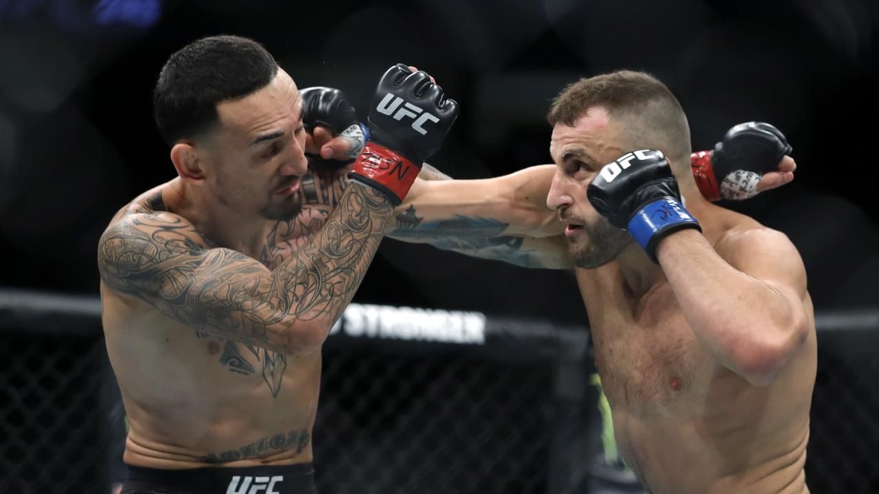 Alex Volkanovski on his way to taking the title from Max Holloway at UFC 245 Steve Marcus/Getty Images/AFP