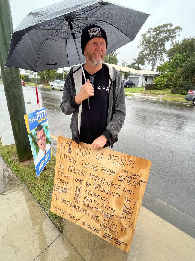 Holding a placard outside the school was Mick Lehtonen, who voted One Nation at this year’s election because of their policy of ending the Covid mandates.