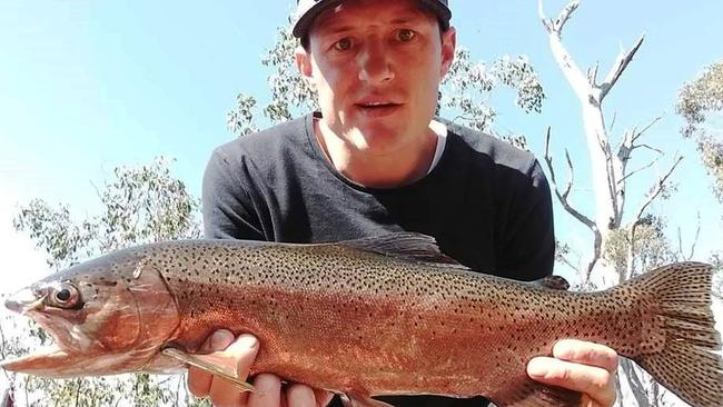 Daniel Johnston, of Burnie, with a nice rainbow from Talbots Lagoon. (2019)