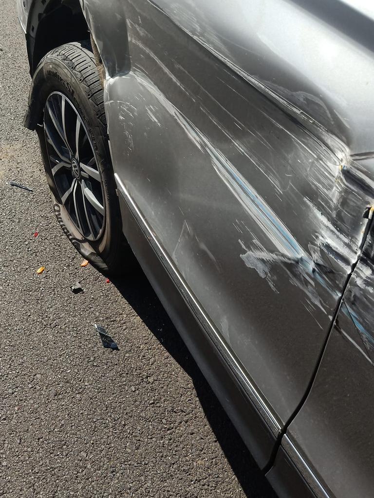 One of the cars heavily damaged by a bus in a reported hit-and-run incident on Alderley Street in South Toowoomba on Monday.