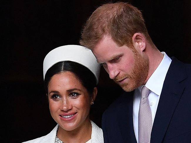 (FILES) In this file photo taken on March 11, 2019 Britain's Prince Harry, Duke of Sussex (R) and Meghan, Duchess of Sussex leave after attending a Commonwealth Day Service at Westminster Abbey in central London. - Prince Harry will produce a documentary about the Invictus Games for disabled military veterans -- the first series under a lucrative deal he and  wife Meghan Markle signed with Netflix after moving to California last year.  Harry, who served with the British military in Afghanistan, will appear on camera and executive-produce "Heart of Invictus," a multi-episode series which follows competitors as they train for next spring's competition in The Hague. (Photo by Ben STANSALL / AFP)