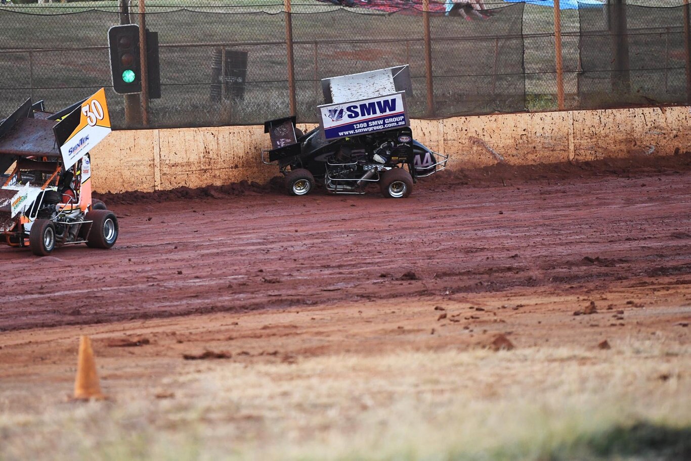Maryborough Speedway Round One - Ken Newton climbs the wall after losing control on the slippery track. Picture: Cody Fox