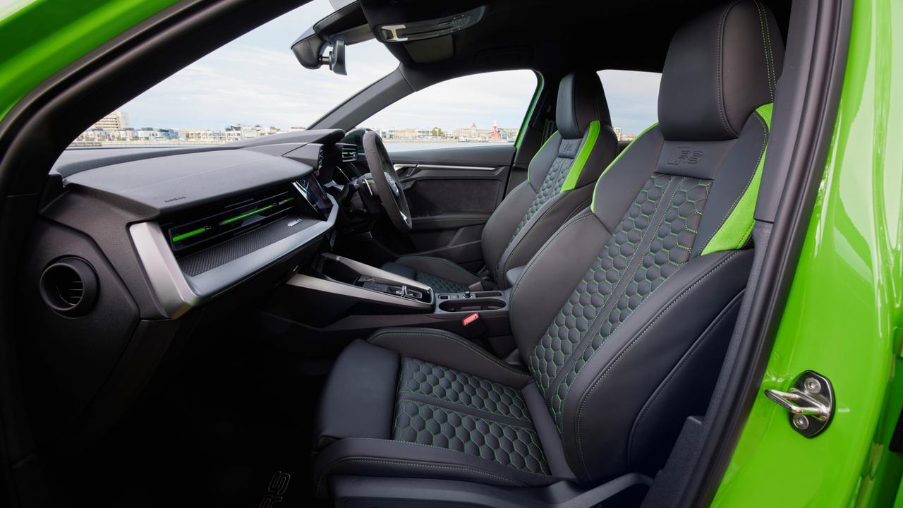 Quilted green seats make a strong impression in the cabin.