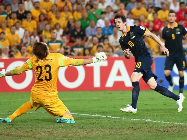 BRISBANE, AUSTRALIA - JANUARY 17: Robbie Kruse of the Socceroos takes a shot at goal during the 2015 Asian Cup match between Australia and Korea Republic at Suncorp Stadium on January 17, 2015 in Brisbane, Australia. (Photo by Cameron Spencer/Getty Images)